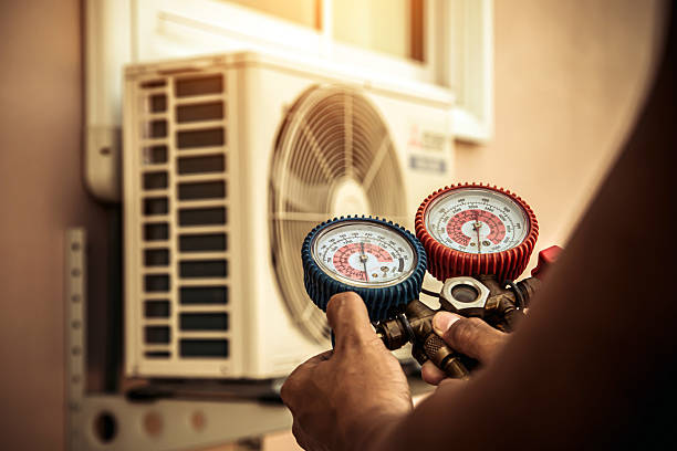 Professional Furnace Repair technician working in Wales Center, NY